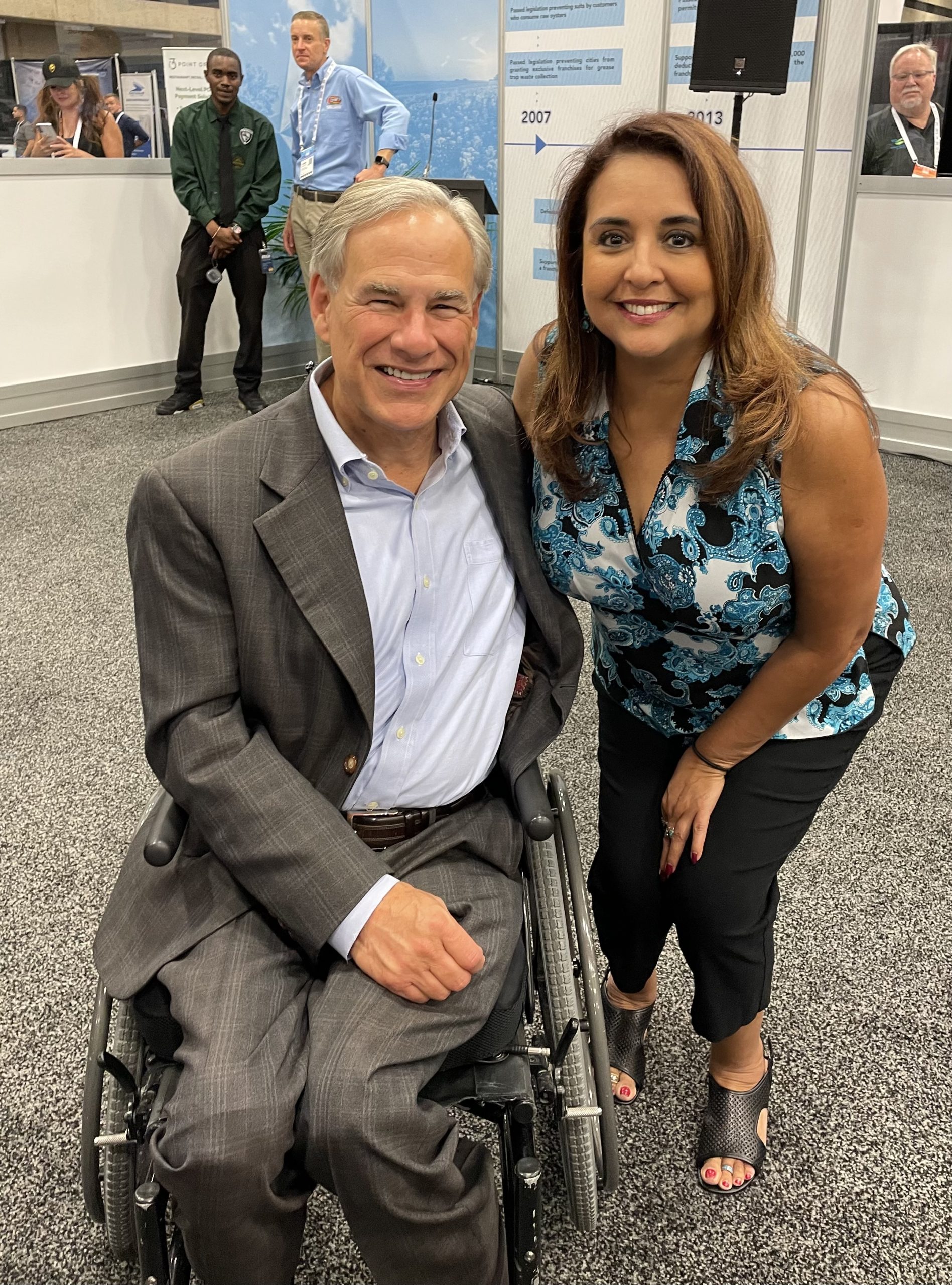 May Mendoza with Governor Greg Abbott